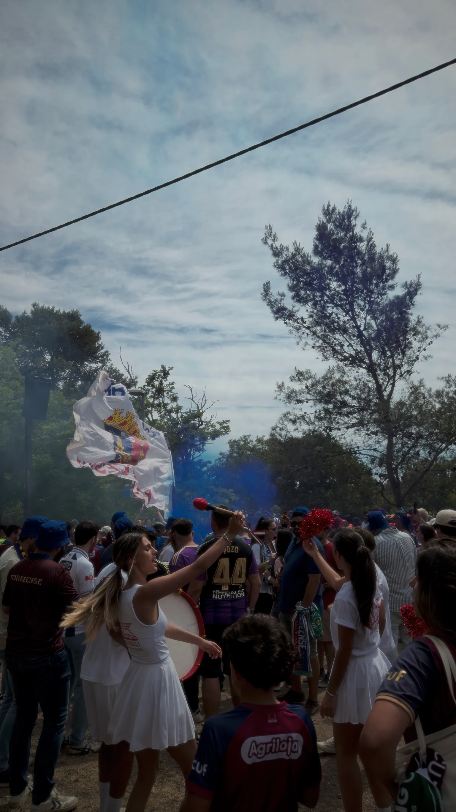 Torreense supporters gathering in blue smoke before the Portuguese Cup final at Jamor