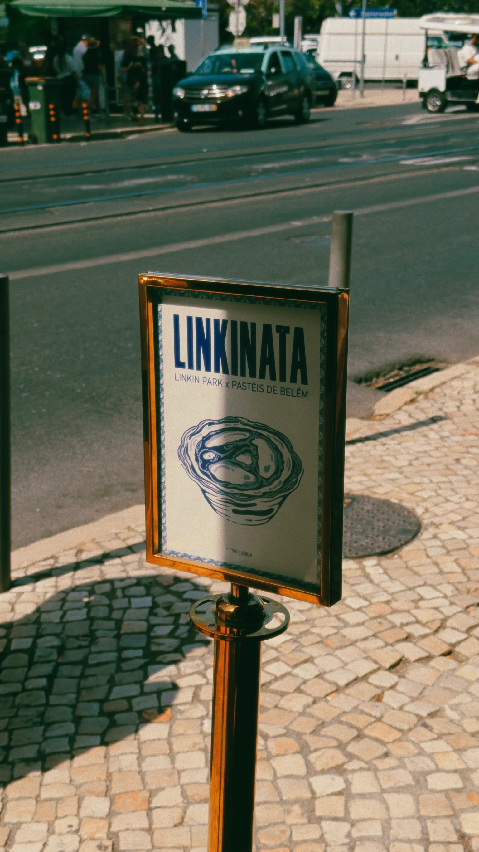 A framed promotional sign reading Linkinata displayed in Lisbon